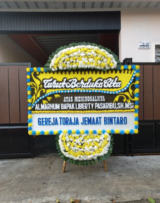 Papan Bunga Duka di Haju